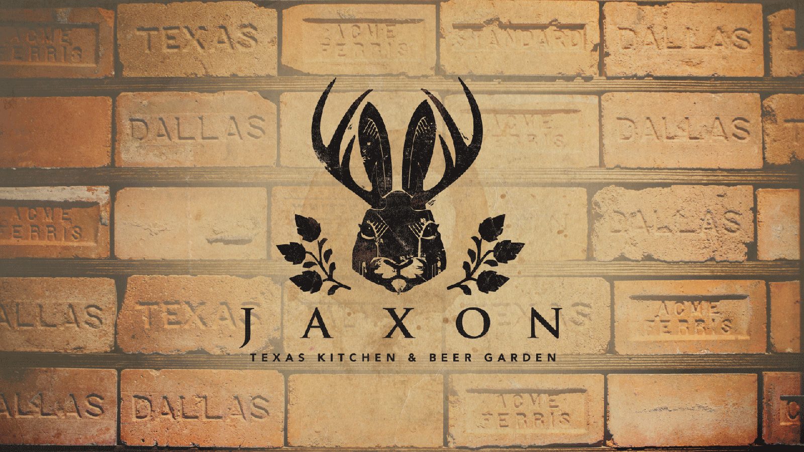 Jaxon jackalope logo on Dallas brick